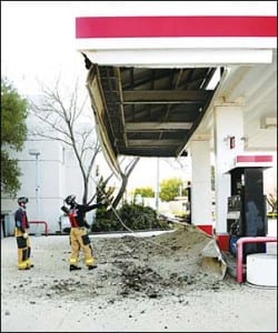 Collapsed gas station due to excess of pigeon droppings on roof.